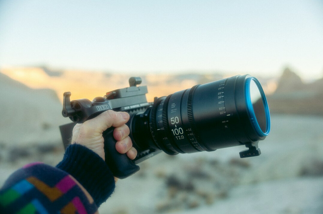 Cinema camera with lens pointing at the viewer